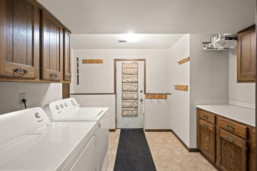 Laundry located off of the garage for convenience! Great storage for sports equipment and winter gear! Plus 2- car garage with epoxy floors.
