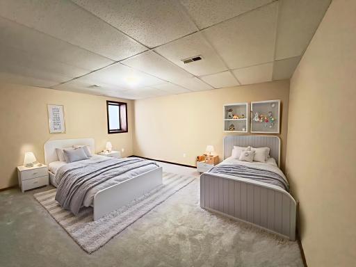 Huge 5th Bedroom in lower 4th level. New carpet! Could easily be an office/guest room. Virtually staged.