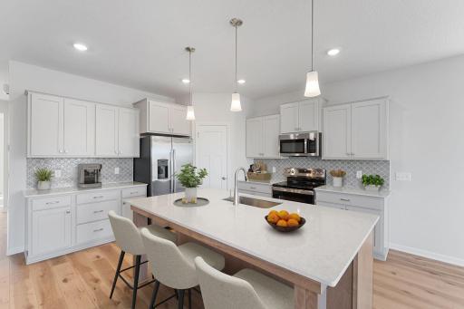 Photo for 15354 112th Avenue N, Dayton, MN 55369 - listing #6731427 Spacious kitchen with ample countertop for dining preparations and entertaining! Photo shows actual home and designer curated options.