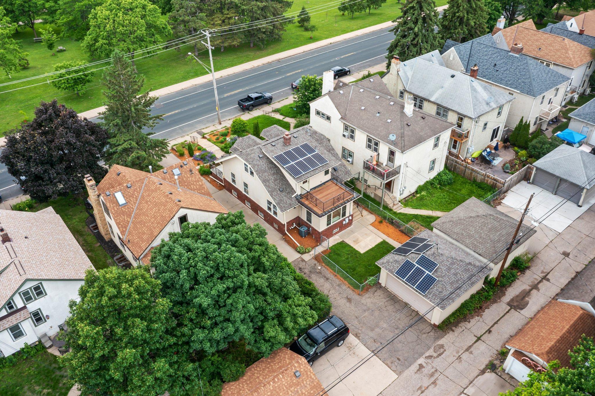 Sixteen solar panels were installed on the home and garage in 2017, and the backyard is fully enclosed with chain link fencing for added privacy.