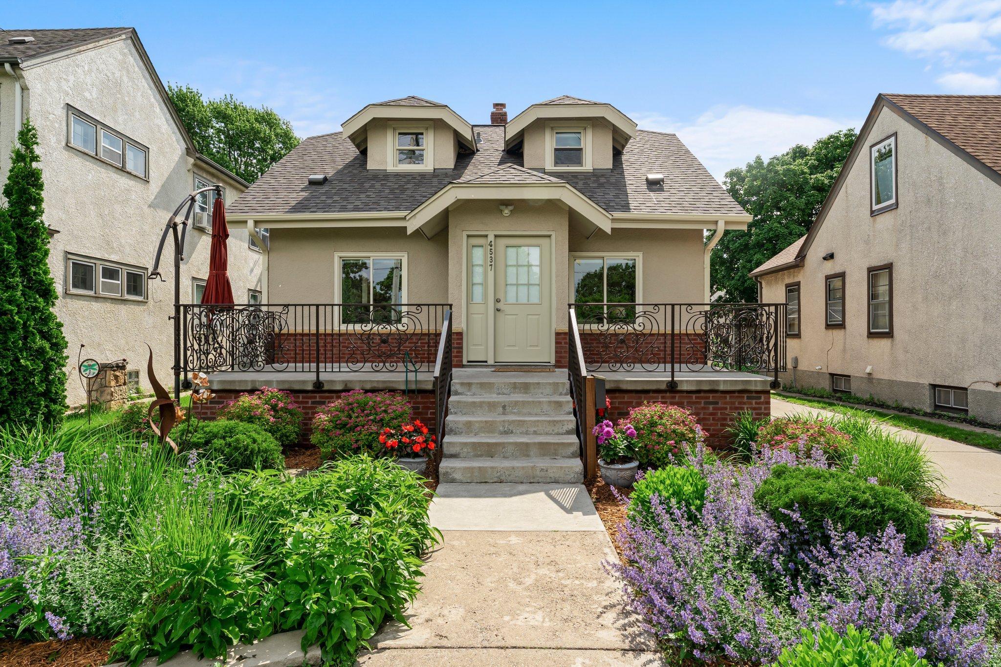This beautifully updated three-bedroom, two-bathroom home offers a truly rare opportunity to enjoy lakeside living right in the city. Perfectly situated across from Lake Hiawatha, Hiawatha Park, and the golf course!
