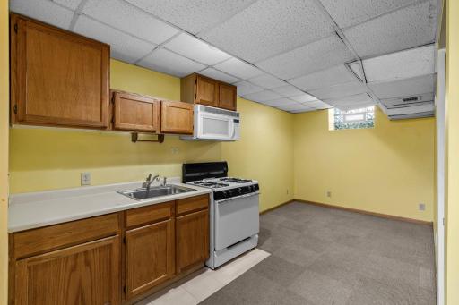 The lower-level studio unit is great for a potential in-law suite or additional rental income.