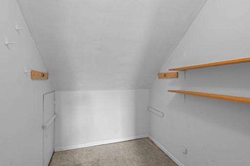 Ample storage space on the upper level provides a practical solution for keeping belongings organized.