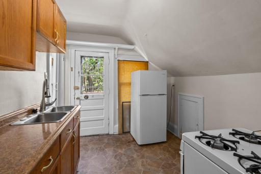 Upstairs, discover the 3rd unit with its own private entrance, making it ideal as a separate apartment or short-term rental.