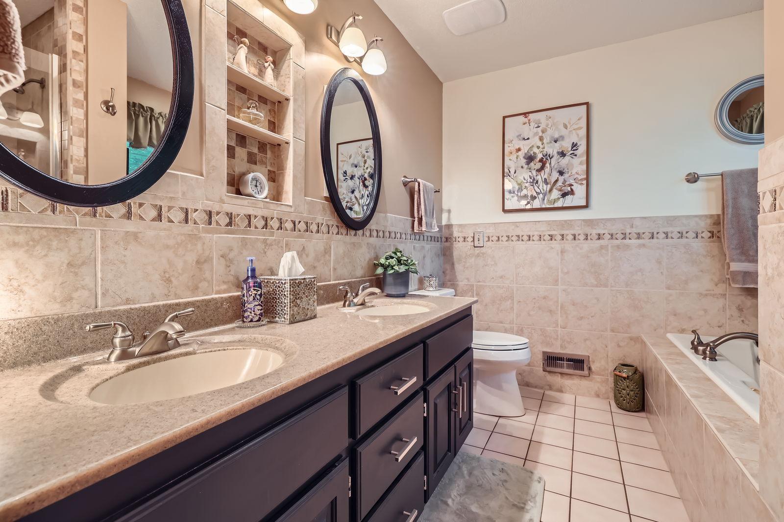 12564 Isanti St NE - Web Quality - 021 - 26 2nd Floor Primary Bathroom.jpg