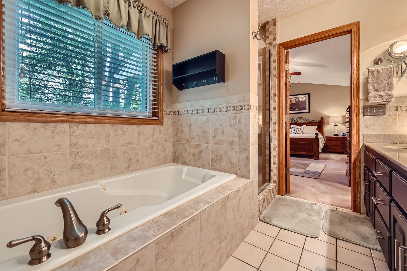 12564 Isanti St NE - Web Quality - 022 - 27 2nd Floor Primary Bathroom.jpg