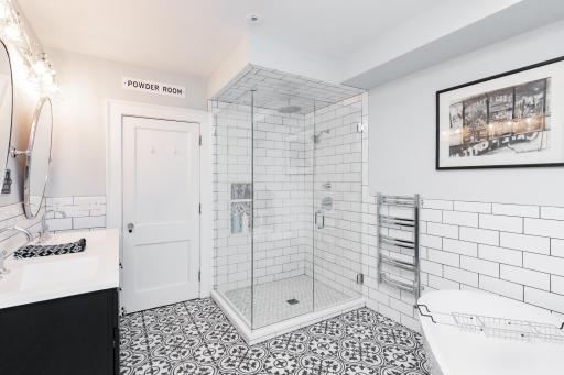 Glass shower. towel warmer & heated tile floors