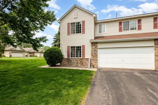 Welcome to this spacious 3-bedroom corner unit 13049 Europa Trail Way N. in Hugo!