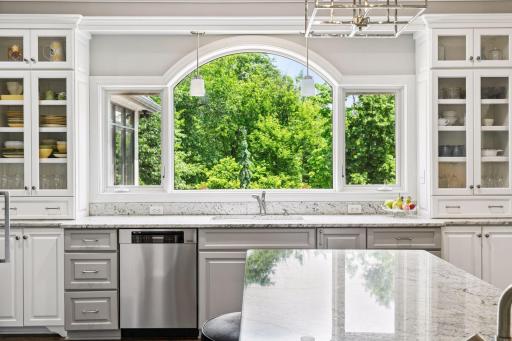 Stainless Steel Appliances and Views of the Backyard