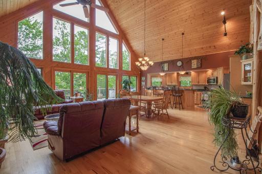 Abundance of light from entire wall of windows and doors to maximize your lake views and front access to 12x36 deck.