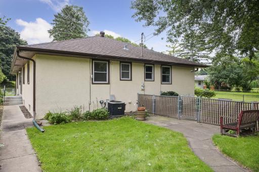 The backyard is fully fenced in with multiple gates