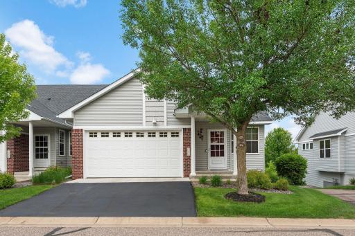 Meticulously maintained Walkout End Unit with Private Pond and Wooded Views with lots of natural lighting! You are going to love this one!