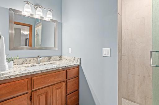 Uniquely designed full bathroom upstairs makes it easy for multiple people to get ready at once. Shower on one side of the vanity and a separate tub and toilet on the other side.