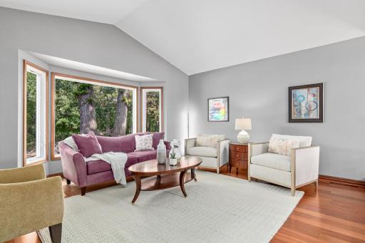The living room is located near the foyer and extends to the oversized dining space- entertaining small and large groups is a breeze in this gorgeous home.
