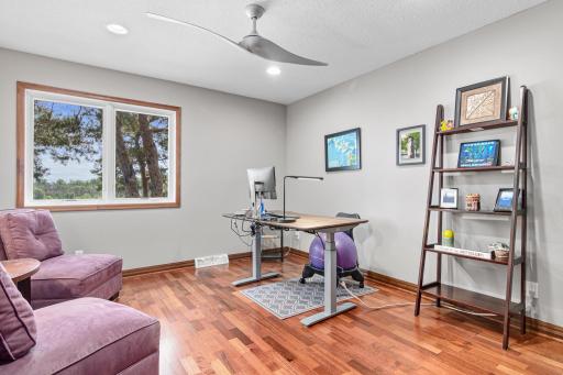 This fourth bedroom upstairs is being used as an office. Work is much better with lake views!