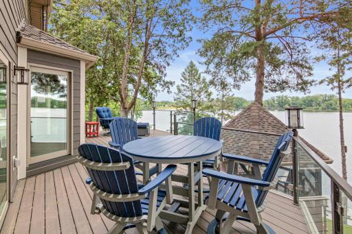 Dine alfresco during the summer months. Newer deck, railings, siding, windows, doors and more.