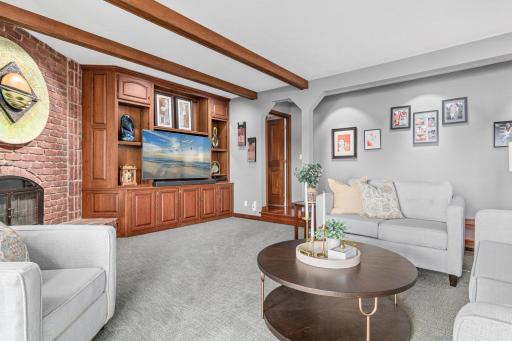 Whether you're curled up with a book, playing board games with the kids, or enjoying a quiet morning coffee, this family room is the focal point on the main floor.