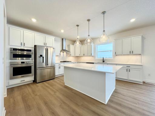 (*Photo of similar home, actual homes colors and finishes will vary)