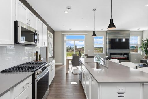 (Photo of model home)Socialize while making your favorite meal!