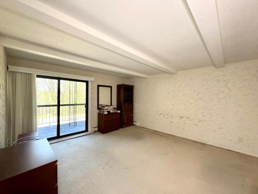 Primary Bedroom w/ Private Balcony