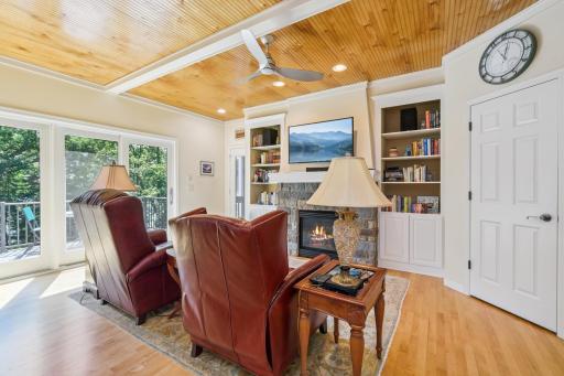 Cozy up to the fireplace for your favorite show or a good read