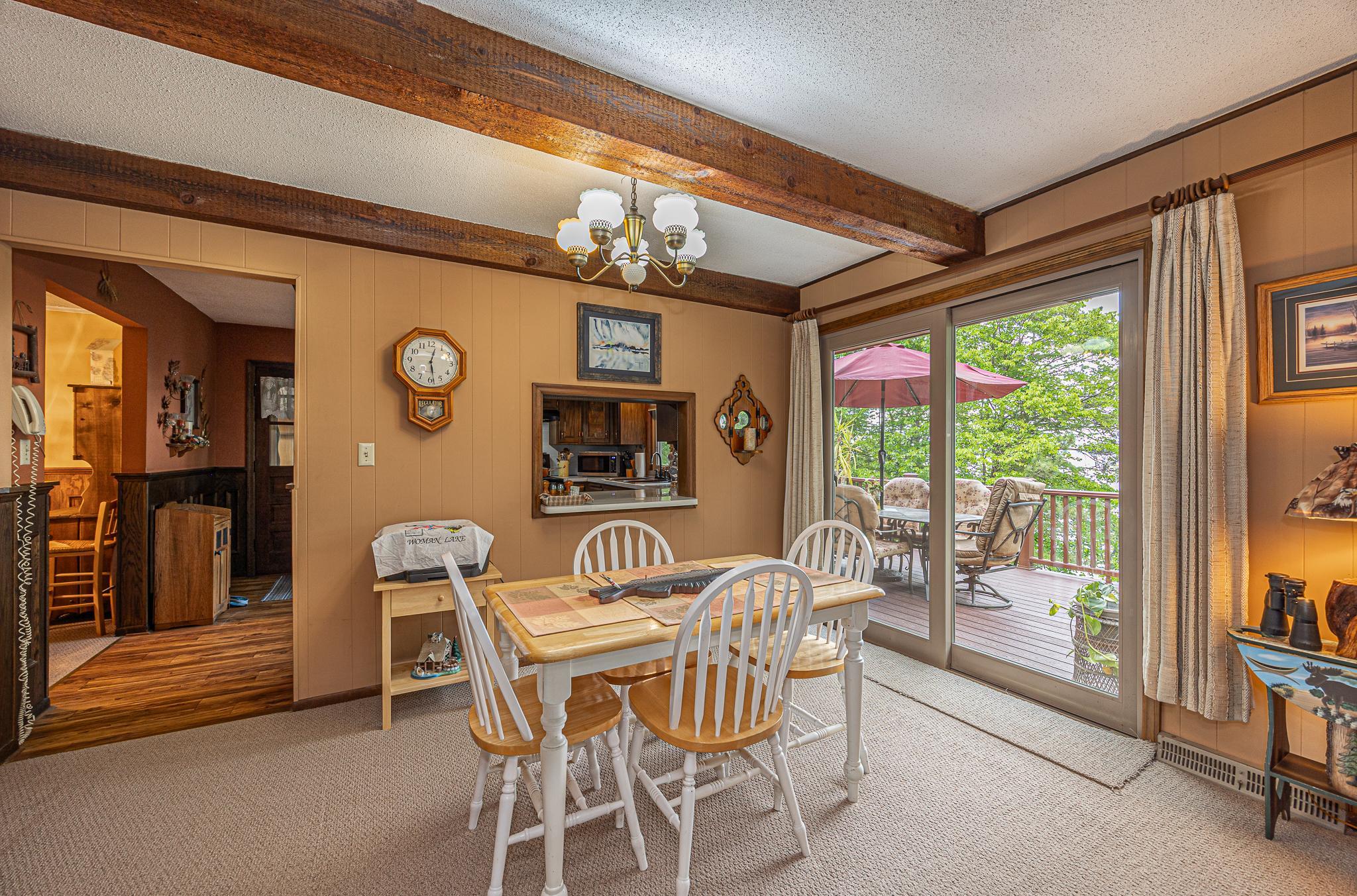Dining area with lake views and great access to the lakeside deck.