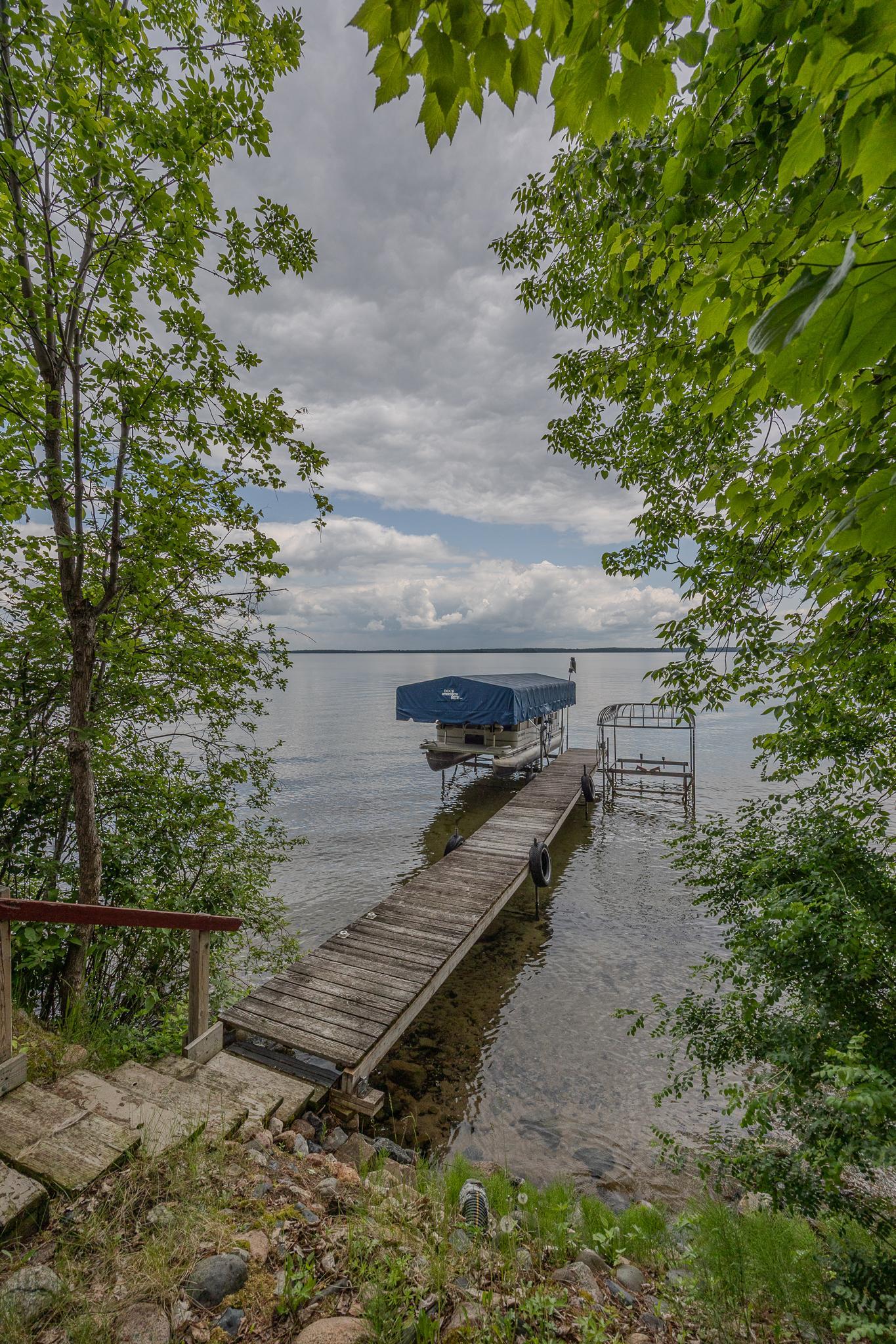 100ft of shoreline on Woman Lake.