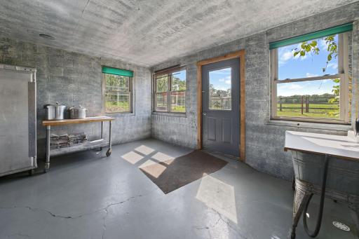 Laundry room and walk-out. Easy access for both taking washed laundry out to dry, and for those days that the dirty clothes get no further inside than the laundry room.