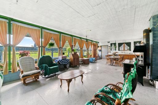 Greenhouse space, living room and part of kitchen.