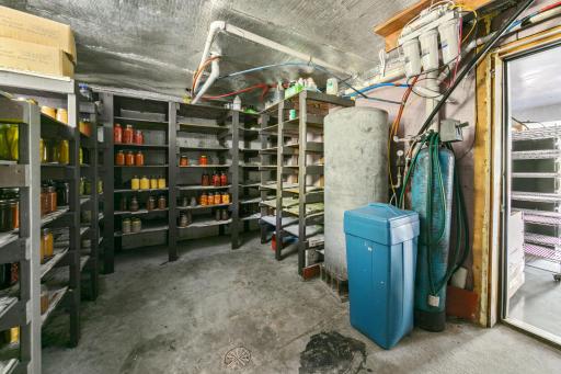 Cellar space for food storage, water pressure tank, water softener system, and reverse Osmosis filter. Water quality was tested every six months for commercial license.