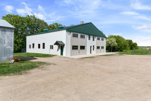 59' x 58' shed with 16' sidewalls, four large skylights, in-floor heat (wood fuel), office and guest quarters with running water.