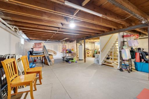 unfinished lower level. Tons of potential if you are craving additional finished space!
