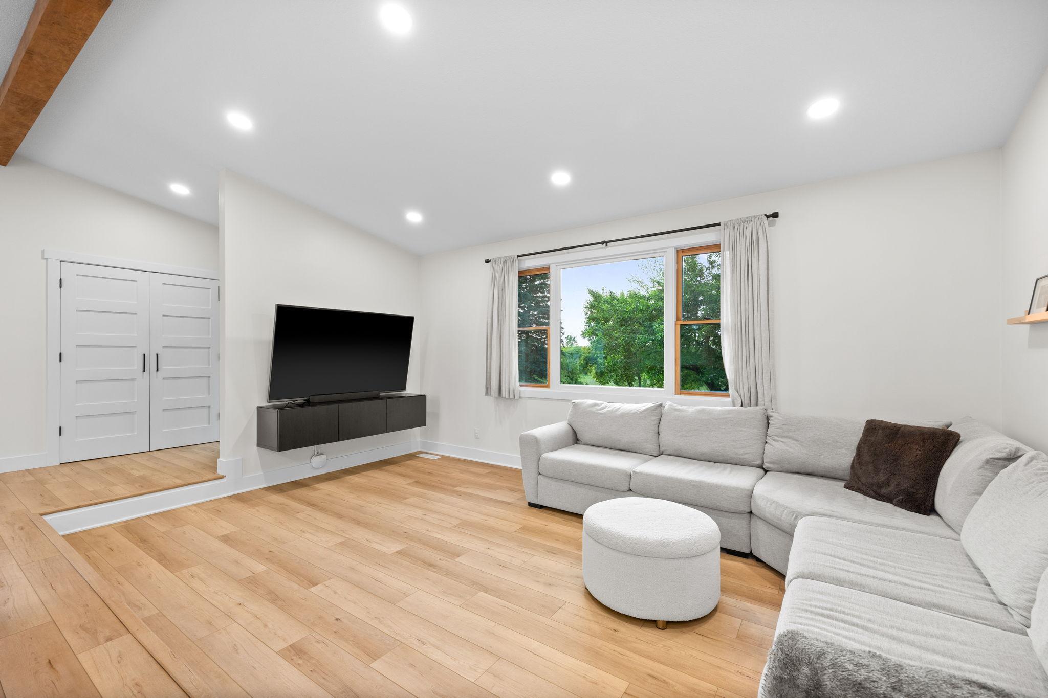 Spacious open concept living room. Trim, casing, baseboard, doors and hardware are all newer.