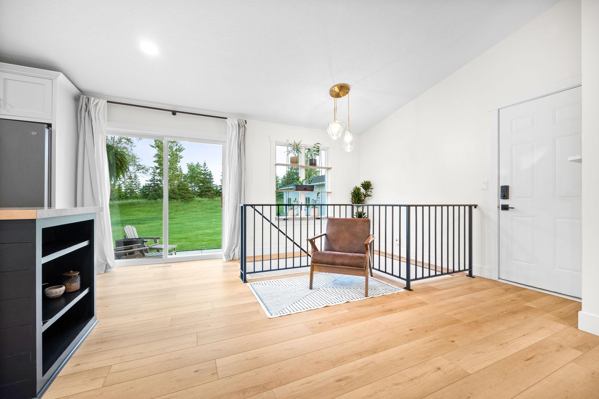 Access to attached garage and back patio for entertaining.