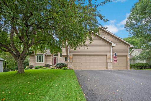 Front view of home with a 3 car wide driveway!