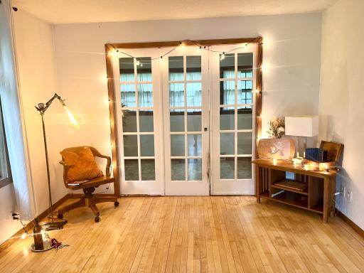 French pocket doors can close off the front porch or slide into the walls for more open space. the front porch area from the living room