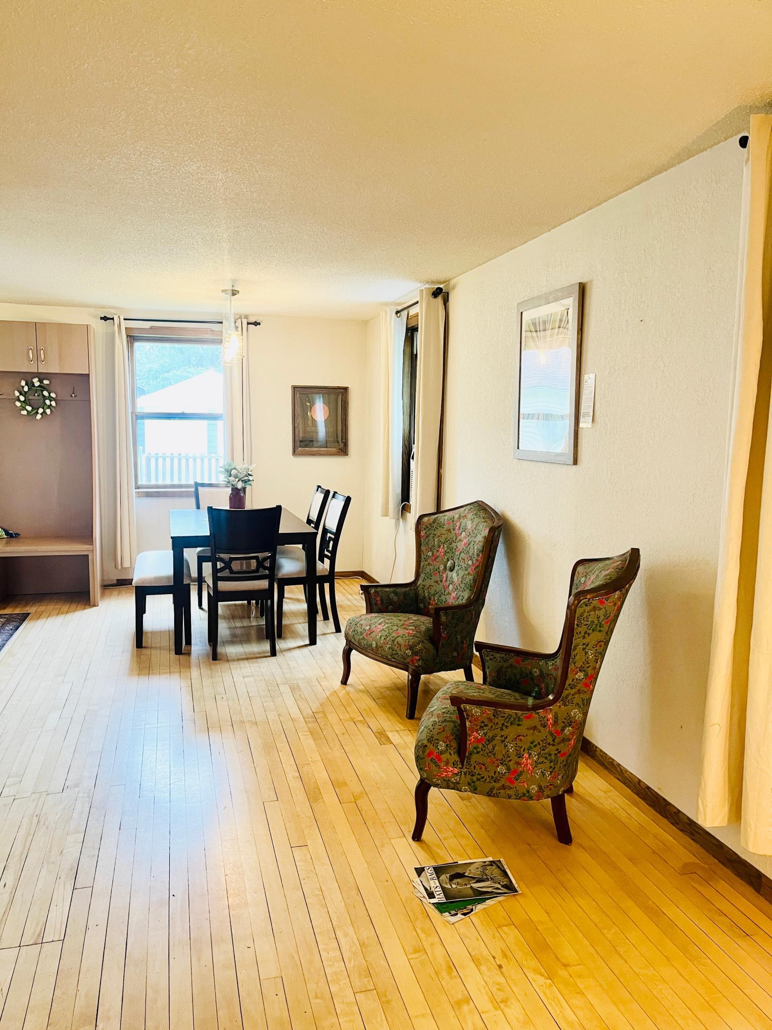 Living room view into dining area
