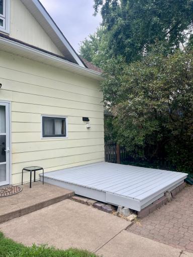 Just re-painted backyard porch is large enough for a table & 2-4 chairs. Seller was told it should last another 10 years! Automatic security lights, Lilacs offer privacy with arrivals and departures.