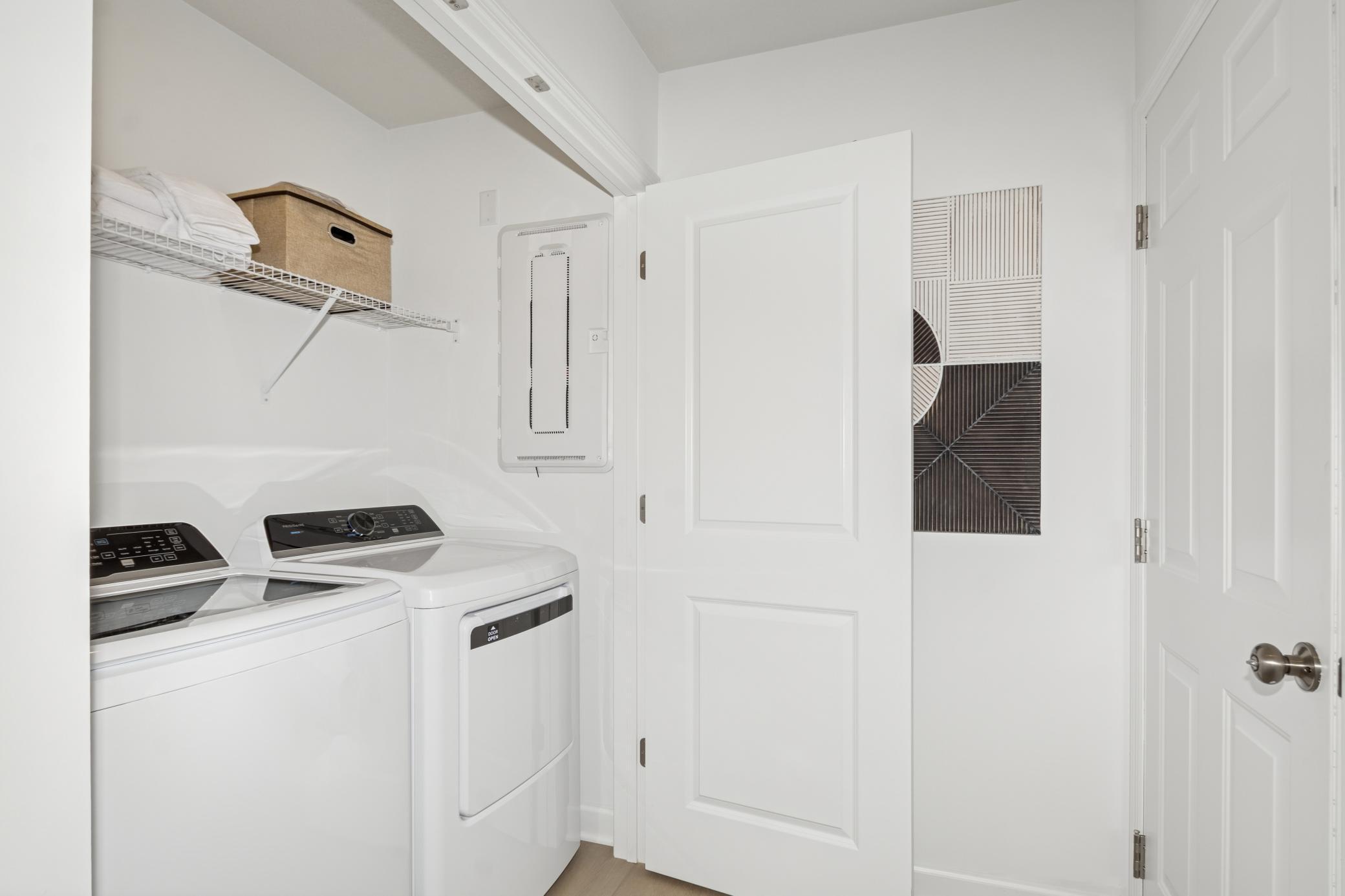 (Photo of the model home) The spacious laundry room!