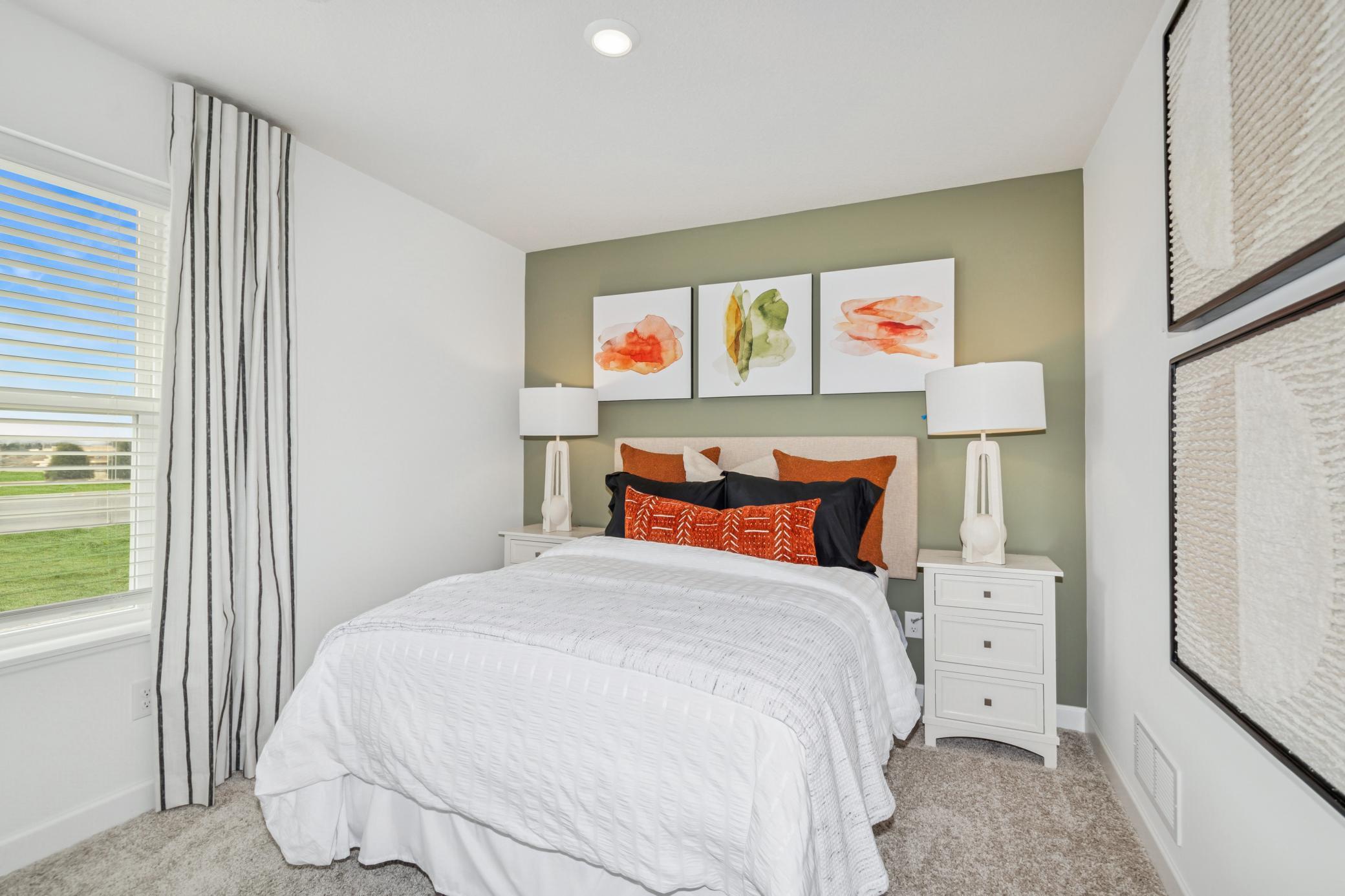 (Photo of the model home) Two of two secondary bedrooms!