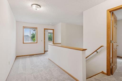 Upper level has 3 bedrooms plus a loft space. We think this is the largest 2-story floor plan in this development.
