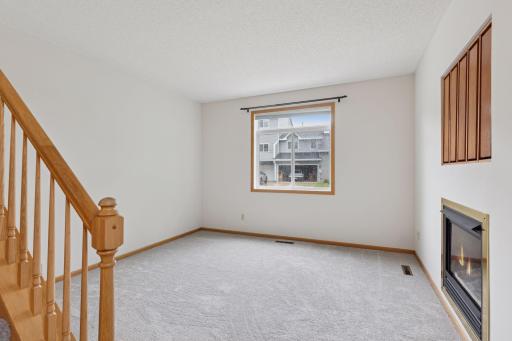 Living room with brand new carpet 6/2025.