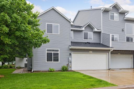 End-unit with side entrance and walkway. Concrete driveway. New roof and siding in 2023.