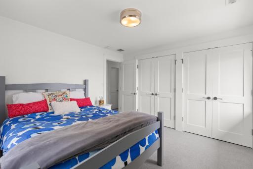 Bedroom on the second level with generous walk-in closets.