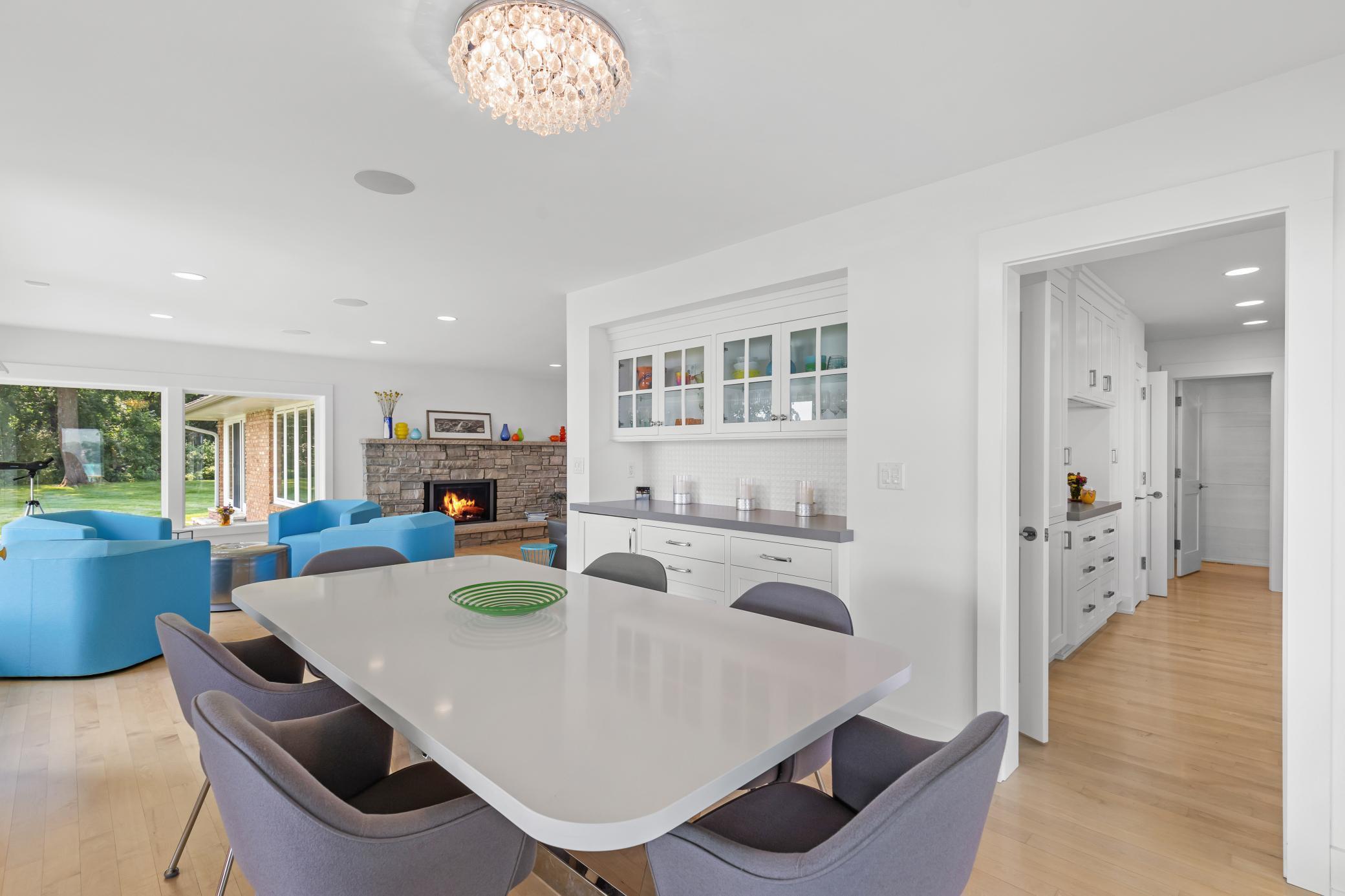 Dining area with enameled built -in cabinets and service buffet.