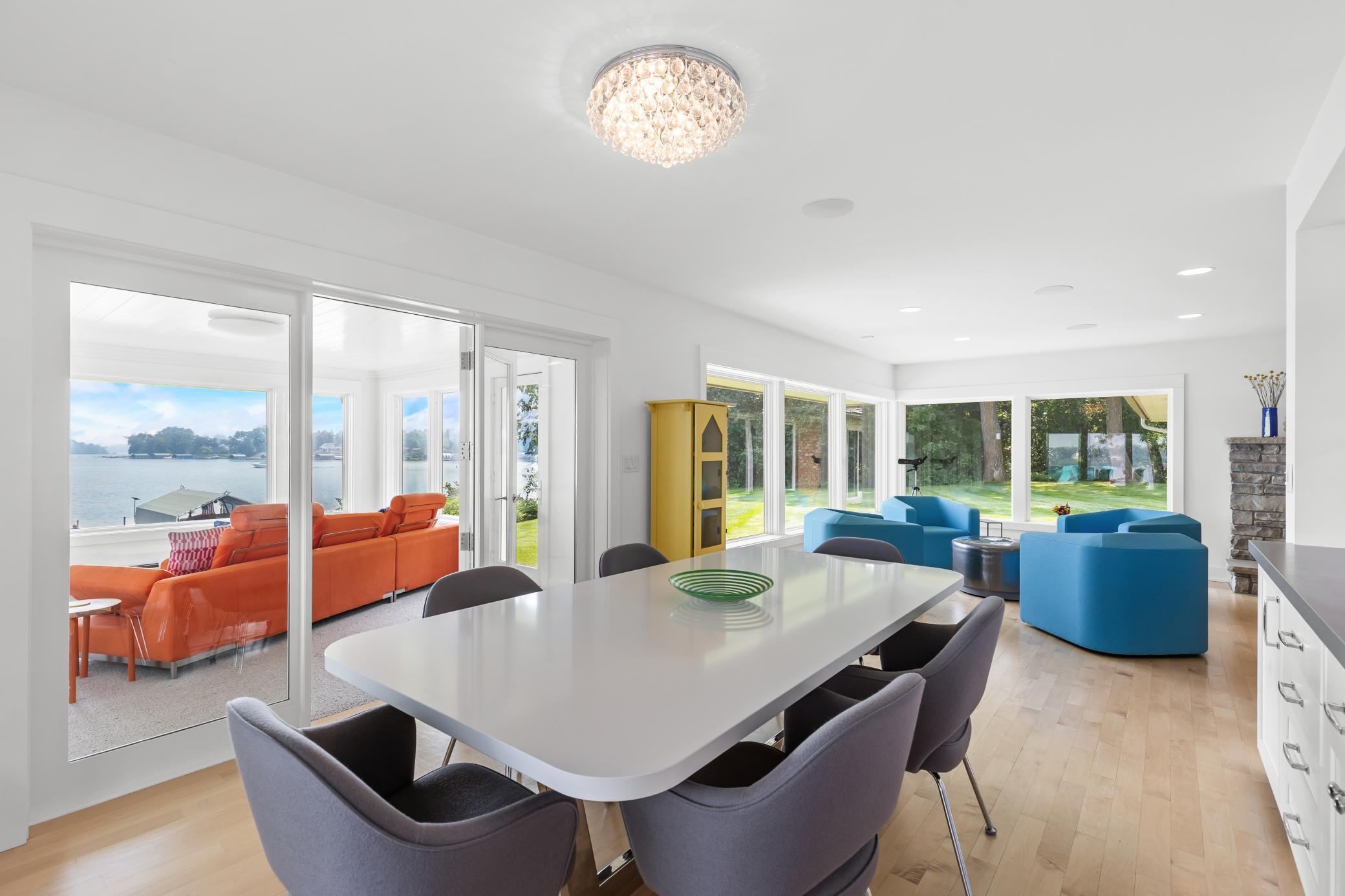 Defining an open floor plan, this dining room flows into the living room and sun room.
