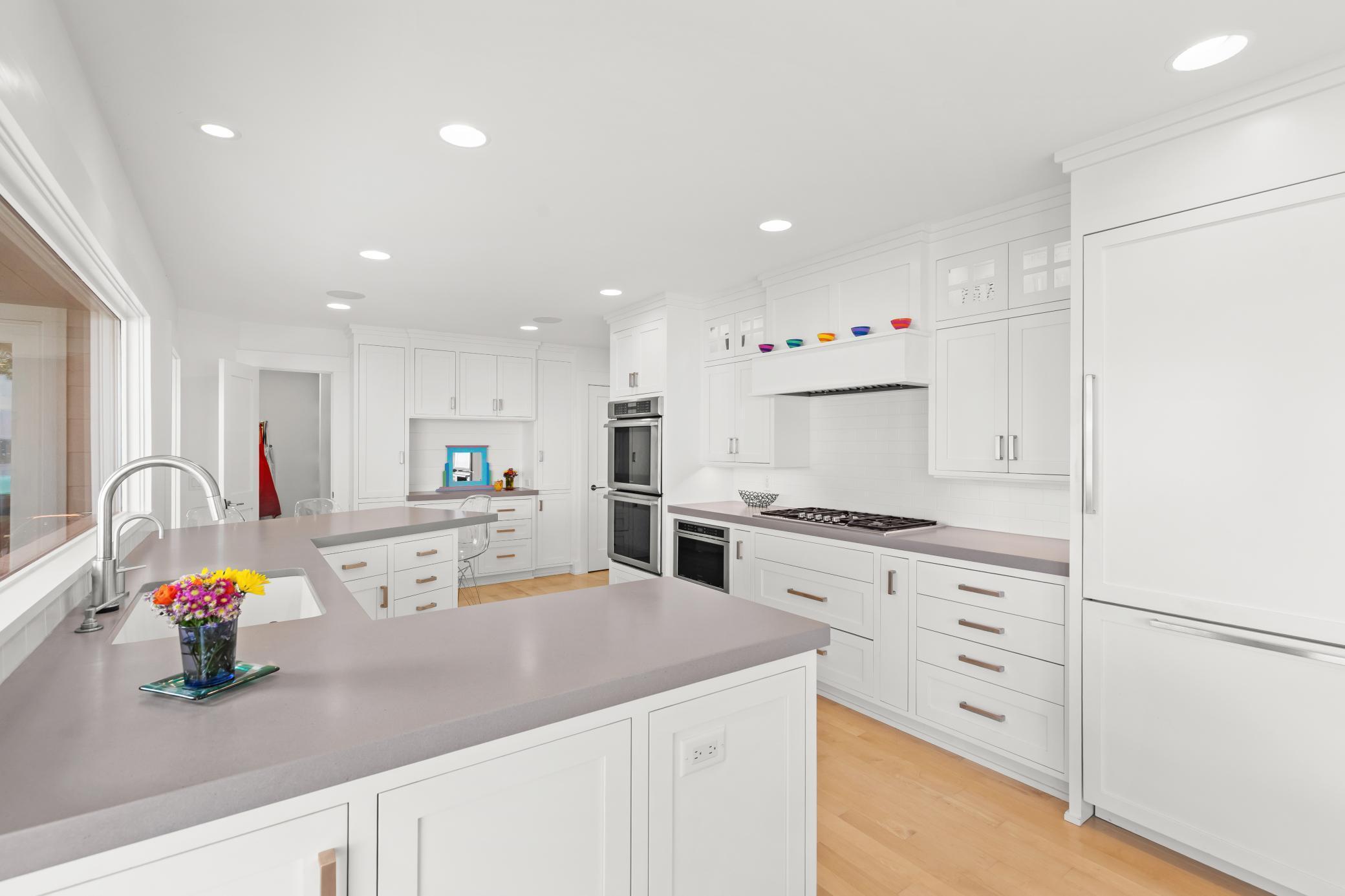 Stainless/gourmet appliances with porcelain backsplash.