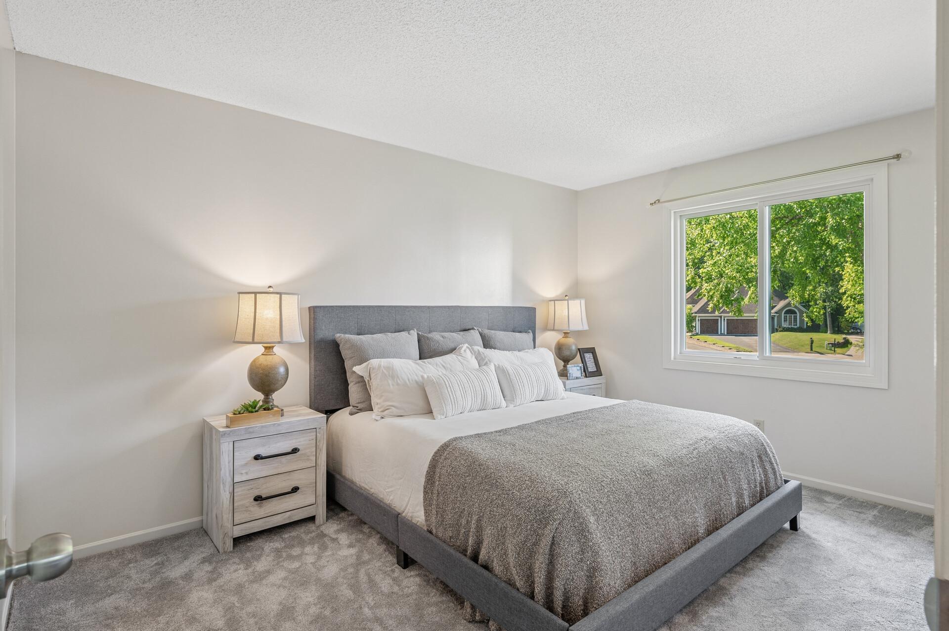 Primary bedroom with a walk-in closet.