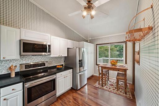 Welcome to your updated kitchen - this photos has been virtually staged
