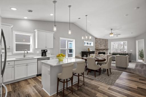 Open Floor Plan, Beautiful granite counters, LVP flooring, stone fireplace and more (Virtually Staged)